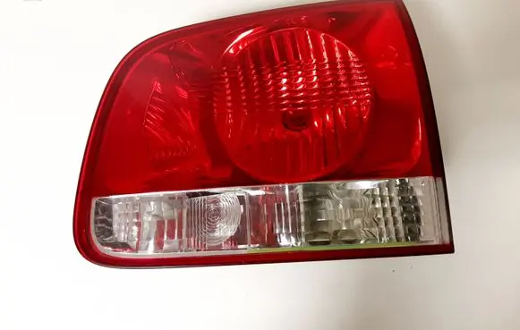 Volkswagen Touareg I Tailgate rear/tail lights 7L8945280