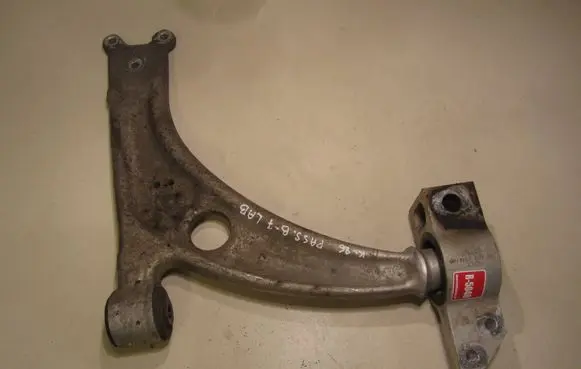 Volkswagen PASSAT B7 Front lower control arm/wishbone 1006100014 T455