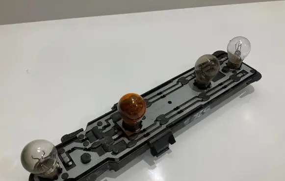 Mercedes-Benz C W203 Tail light bulb cover holder