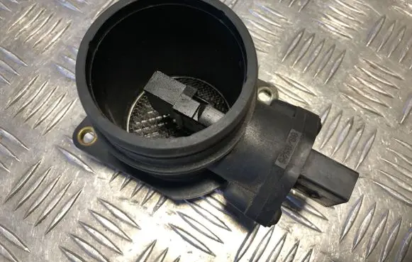 Volkswagen Touran I Mass air flow meter 0280217121 06A906461