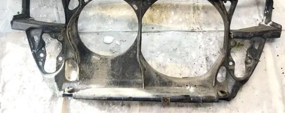 Radiator support slam panel