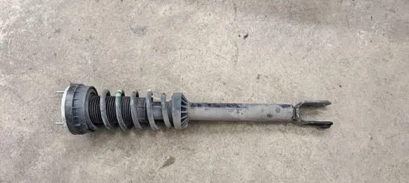 Jaguar XF X260 Front shock absorber with coil spring