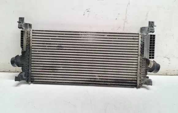 Opel Astra J Intercooler radiator 13267646 3070A