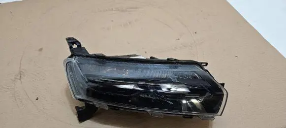 Dacia Spring Headlight/headlamp 266008993