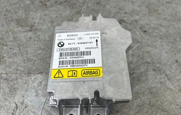 BMW 1 E82 E88 Airbag control unit/module 9166057 0285010066