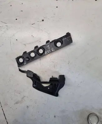 Opel Astra J Rear bumper mounting bracket 13266739
