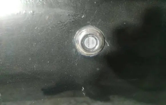 Mitsubishi Pajero Sport I Front door lock (next to the handle) 