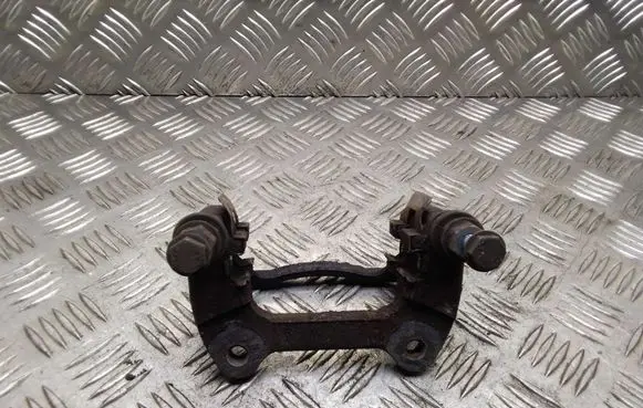 Mini One - Cooper Coupe R56 Brake caliper pad carrier rear 