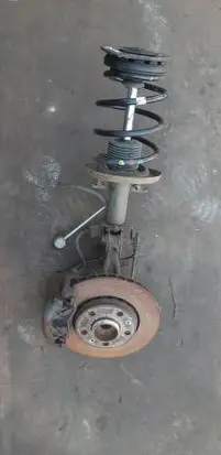 Renault Megane III Front shock absorber with coil spring 