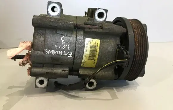 Ford Taurus Air conditioning (A/C) compressor (pump) F7DH19D629BA