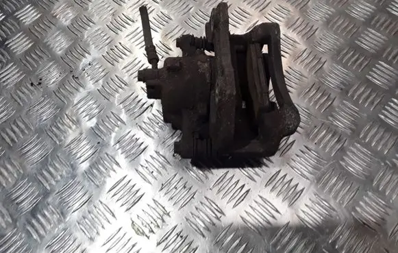 Nissan Almera N16 Front brake caliper