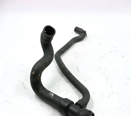 Volkswagen PASSAT B5 Engine coolant pipe/hose 8D0121005F