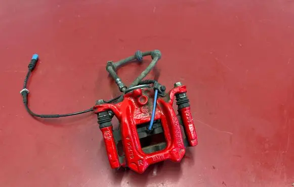 BMW X1 U11 Rear brake caliper 