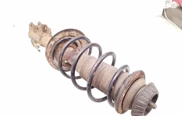 Toyota Yaris Front shock absorber with coil spring