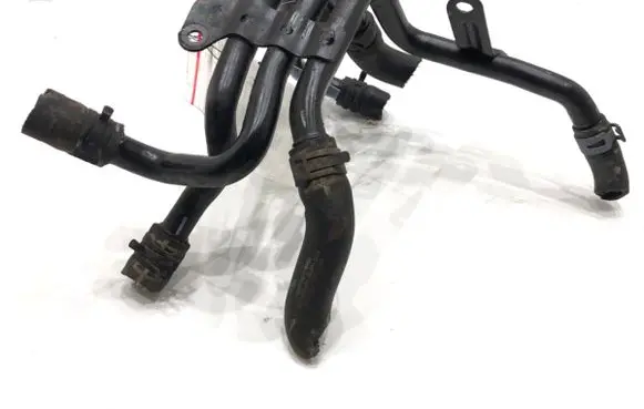 Volkswagen Golf VII Engine coolant pipe/hose 04L121064AD