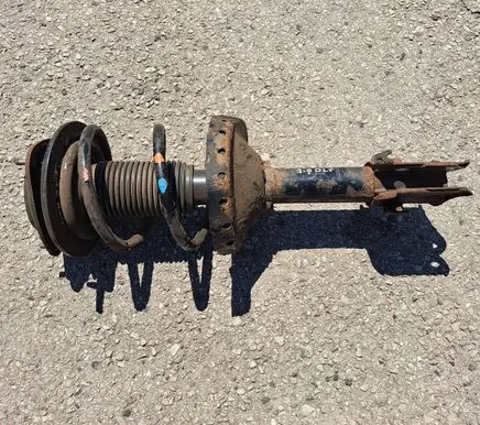 Subaru Outback Front shock absorber with coil spring