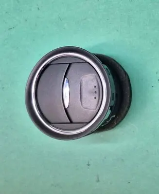 Dash center air vent grill