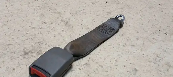 Rear seatbelt buckle