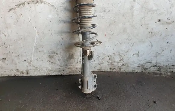 Toyota Yaris Front shock absorber with coil spring