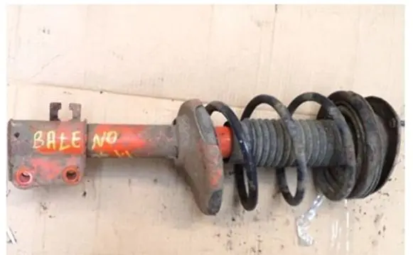Suzuki Baleno EG Front shock absorber with coil spring