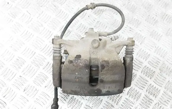 Volkswagen Golf VII Front brake caliper 