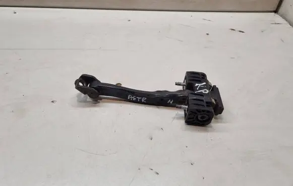 Front door check strap stopper