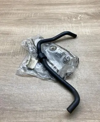 Volkswagen Touran I Engine coolant pipe/hose 1K0121447DH