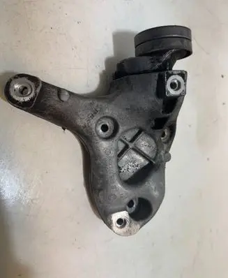 Volkswagen Golf VI A/C compressor mount bracket 1K0260885B