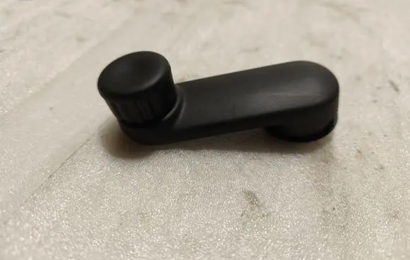 Dacia Sandero III Rear door window winding handle 827608609R