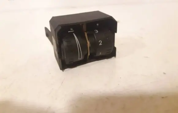 Headlight level height control switch