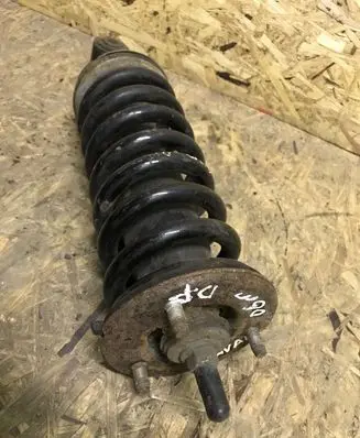 Nissan Navara D40 Front shock absorber with coil spring