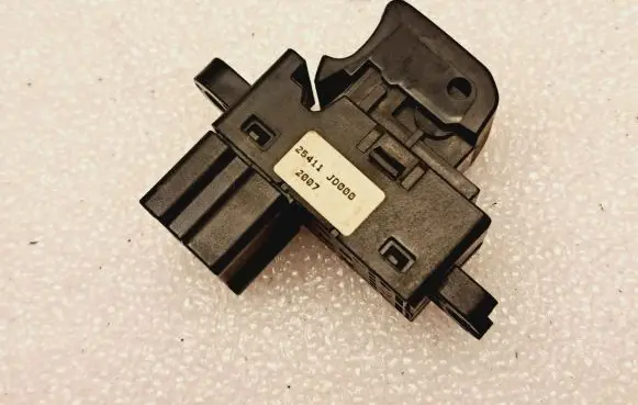 Nissan Qashqai Electric window control switch 25411JD000