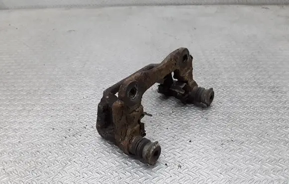 Toyota Avensis T250 Brake caliper pad carrier rear 