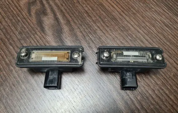 Volkswagen Polo III 6N 6N2 6NF Number plate light 1J6943021