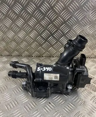 Thermostat/thermostat housing