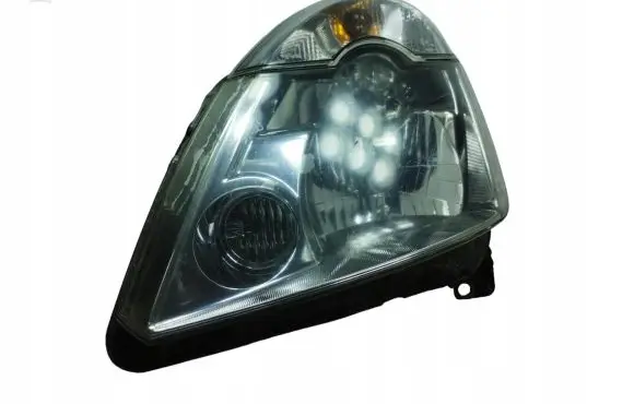 Renault Modus Headlight/headlamp 7701058174