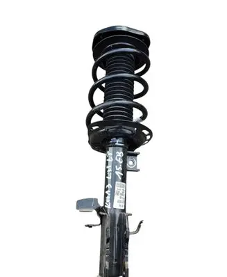 Front shock absorber with coil spring