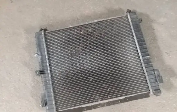 Nissan Note (E12) Coolant radiator 214103VD1A