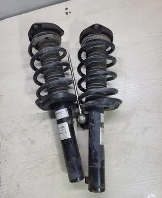 Front shock absorber with coil spring