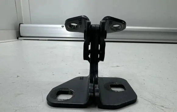 Front door lower hinge