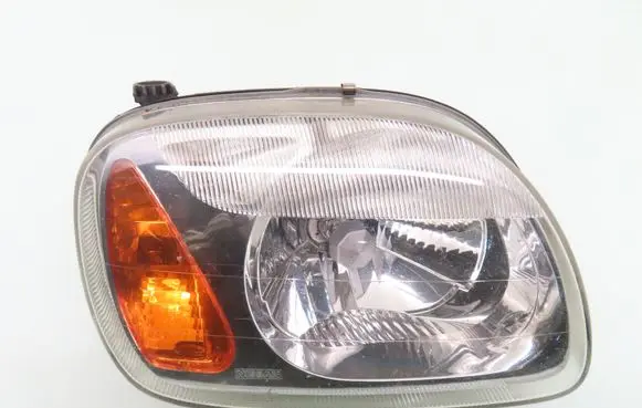 Nissan Micra Headlight/headlamp 89004677 260101F511