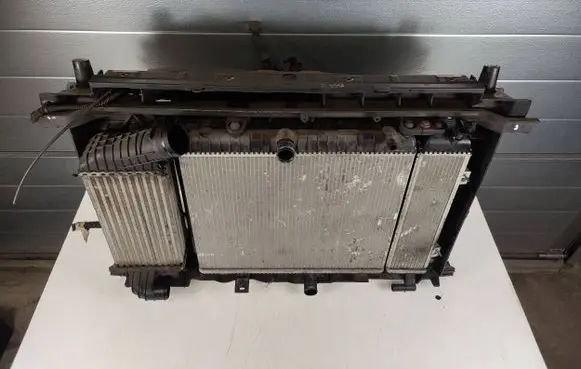 Radiator support slam panel