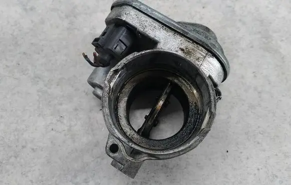 Volkswagen Touran I Throttle body valve 714393260
