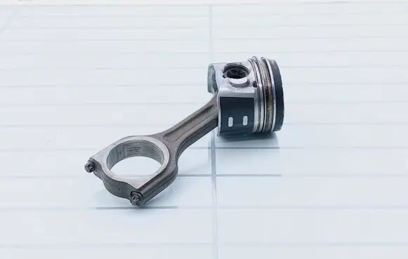 Piston with connecting rod