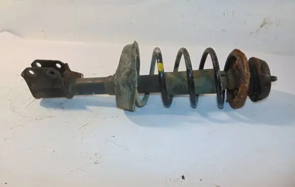 Renault Kangoo I Front shock absorber with coil spring 7700314021 03051000524 8200675686