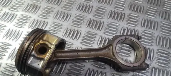 Piston with connecting rod