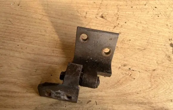 Front door lower hinge