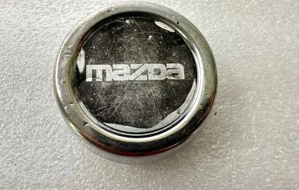 Mazda 323 Non-original wheel cap