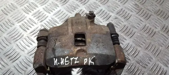 Hyundai Getz Front brake caliper neustatyta