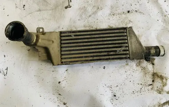 Opel Corsa C Intercooler radiator 24466787